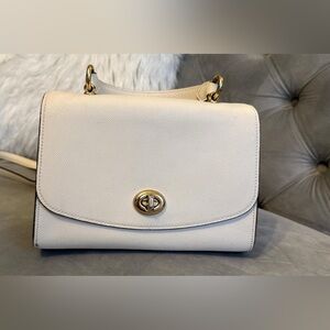 Elegant Cream Handbag with Gold Accents